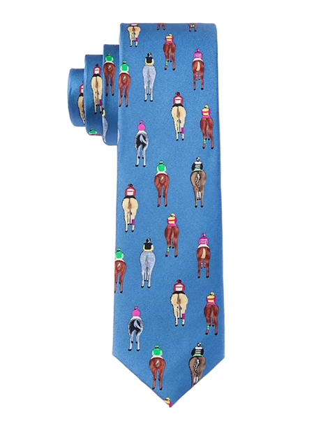 A blue necktie with a repeating pattern of small horse and jockey illustrations in various colors, shown partially unrolled on a light gray background.